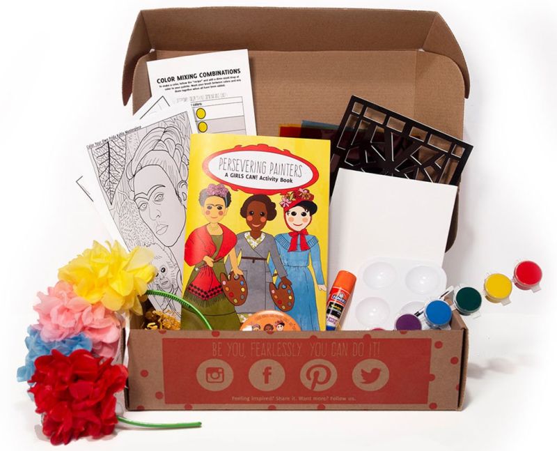 Contents of a Girls Can! Crate subscription box, with paints, flowers, information booklet, and more