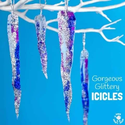 Glittery blue icicles dangle from white branches
