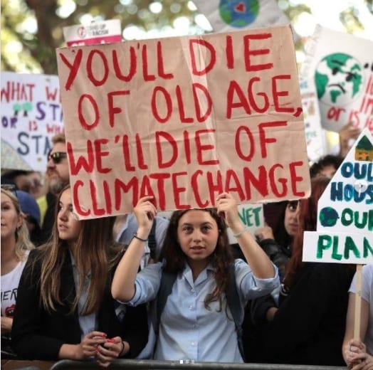 'You'll die of old age. We'll die of climate change' sign