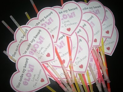 Heart shaped valentines with glow sticks attached