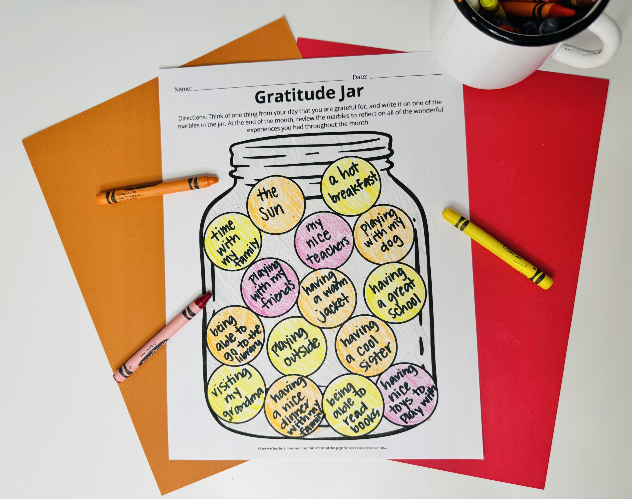Printable gratitude jar activity colored in with crayons.