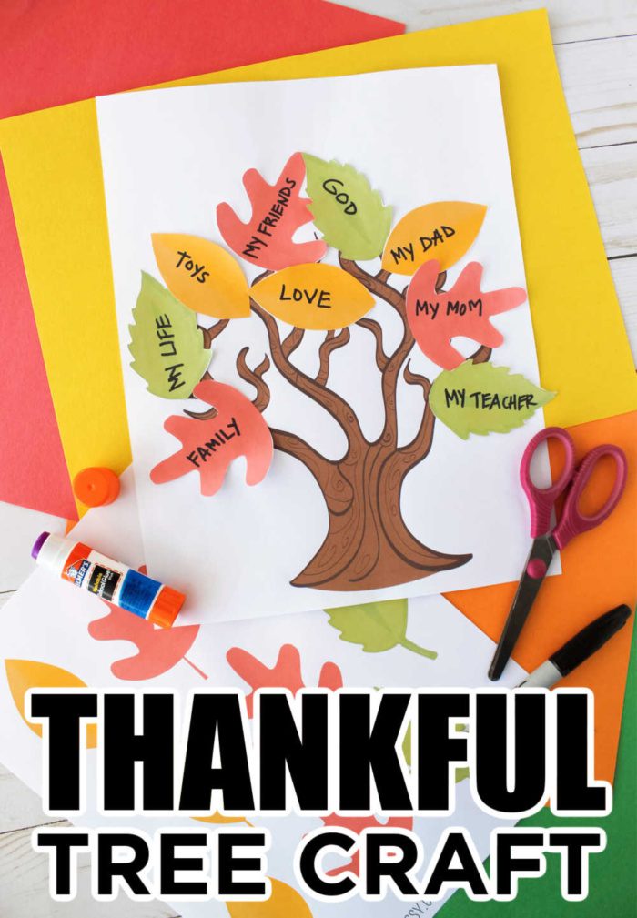A construction paper tree has leaves on it that have things students are grateful for on them.