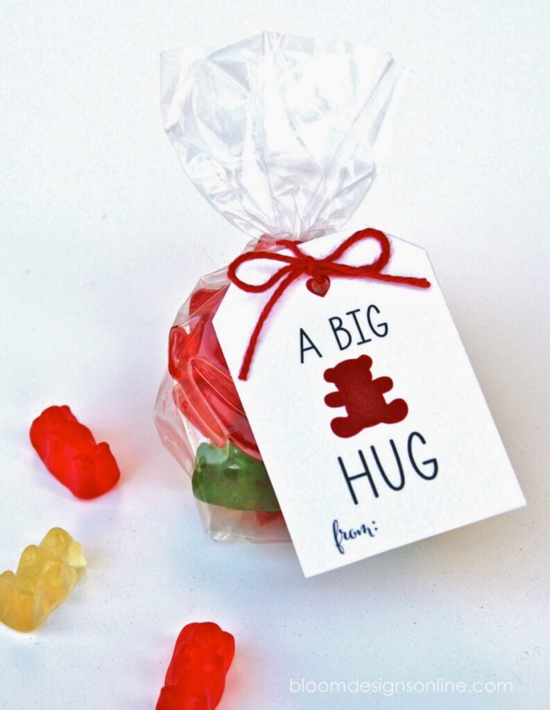 A bag of gummy treats with a valentine card attached