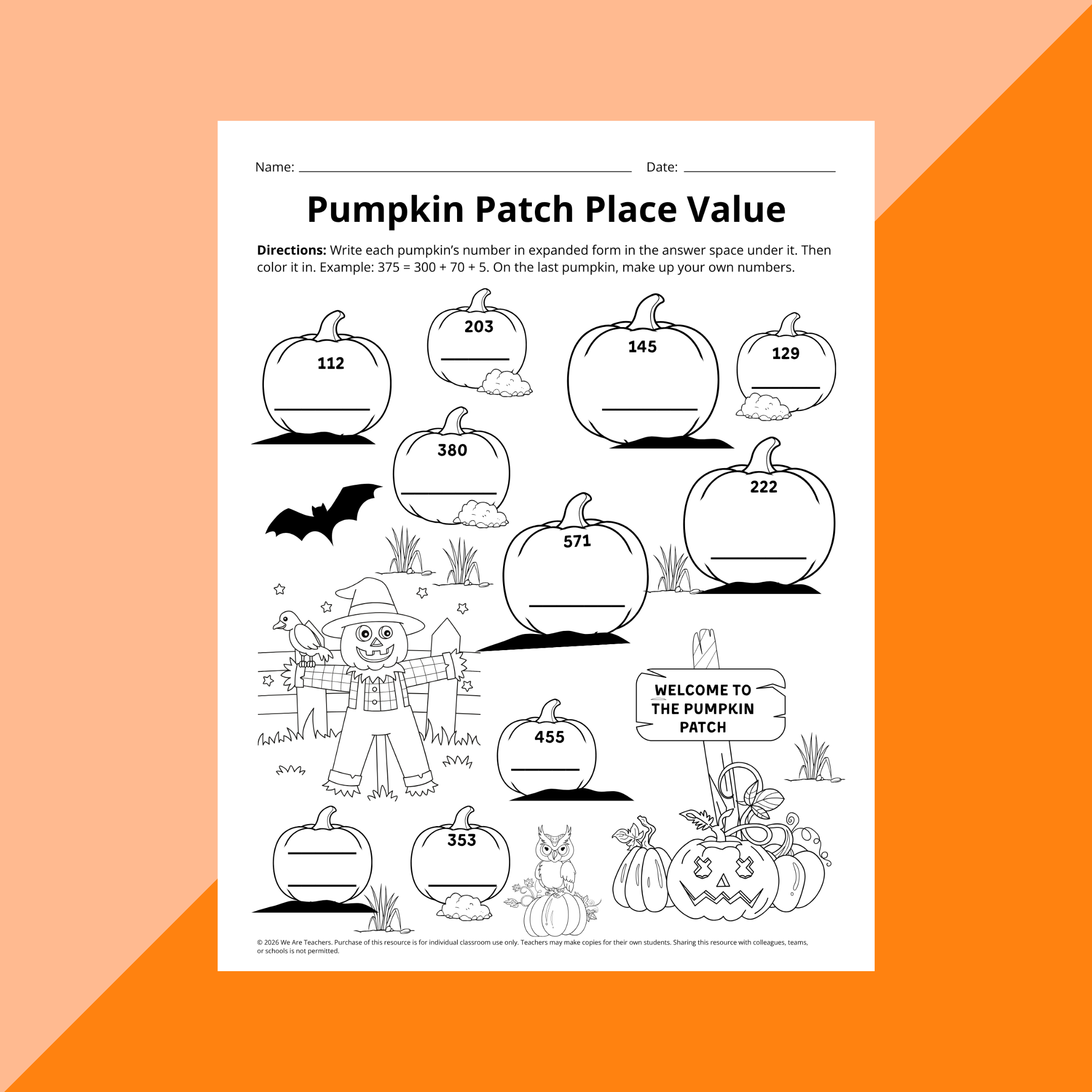 Flat lay of Halloween math place value worksheet on an orange background