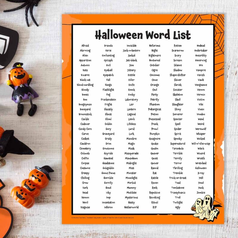 Printable Halloween word list with decorations scattered next to it.