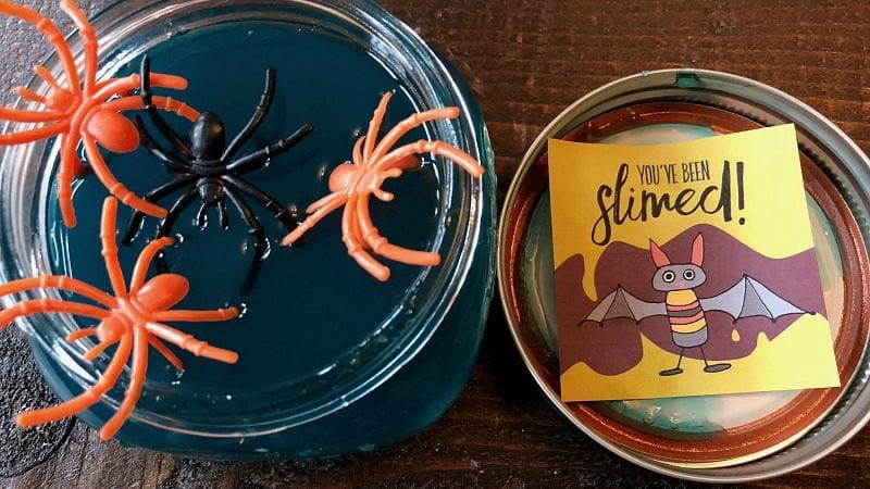 Halloween_Treats_Slime Slime with plastic spiders and Halloween treat tag.