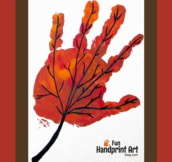 handprint leaf painted in orange