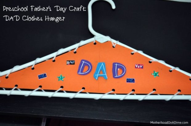 Father's Day crafts for kids can include everyday objects like this clothes hanger that has been decorated and says Dad on it.