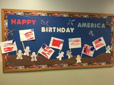 Happy birthday America Fourth of July bulletin board idea red white and blue flags