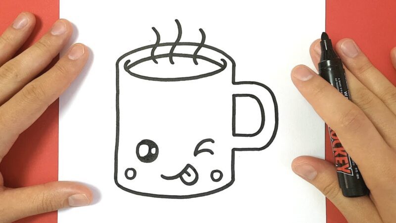 Hands are shown holding a piece of paper that has a simple outline of a mug with a winking face drawn on it.