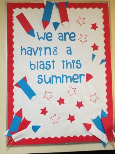 We are having a blast this summer red white and blue fireworks Fourth of July bulletin board idea