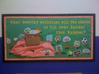 A board has a picnic basket on a blanket. It says what healthy activities will you choose to fill your basket this summer. There are pictures of different activities spread out. (summer bulletin board ideas)