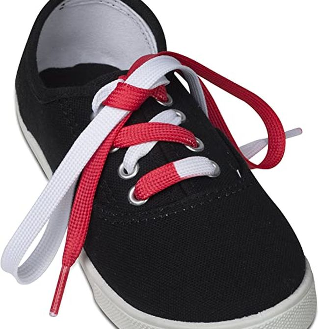 Black tennis shoe with split color laces that are half white, half red (How to Teach Kids to Tie Shoes)