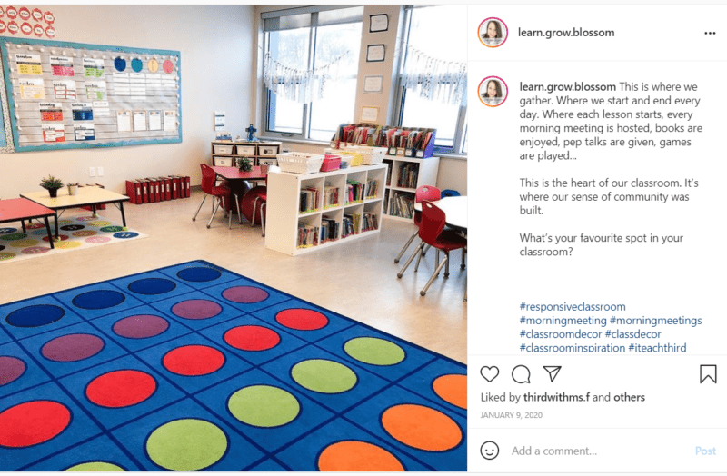 Blue rug with colorful polka dots in classroom with white walls and organizer