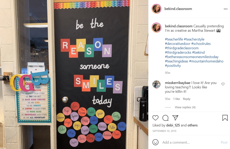 Black classroom door decorated with rainbow colors and student names