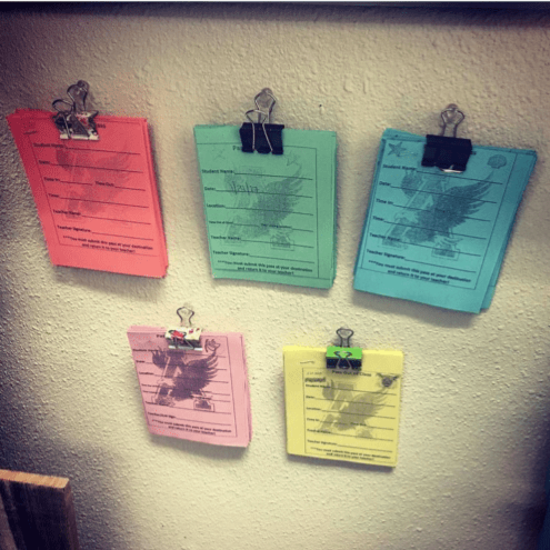 Clips are shown holding small different colored papers.