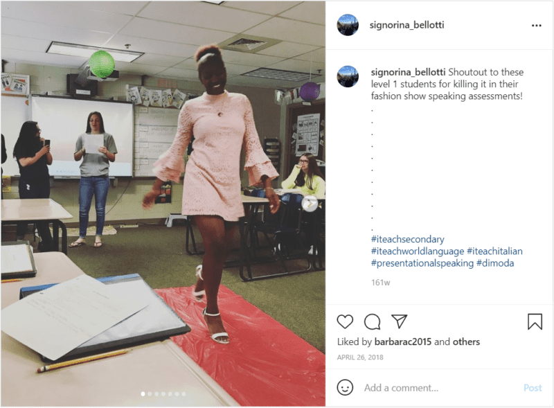Students in classroom on catwalk for fashion show speaking assessment
