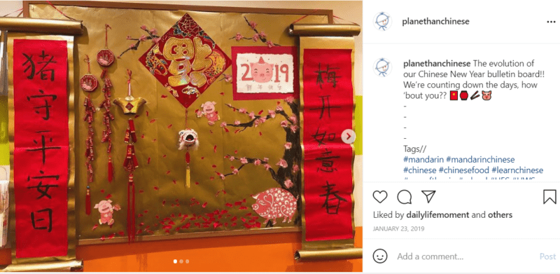 Red and gold classroom bulletin board decorated for Lunar New Year