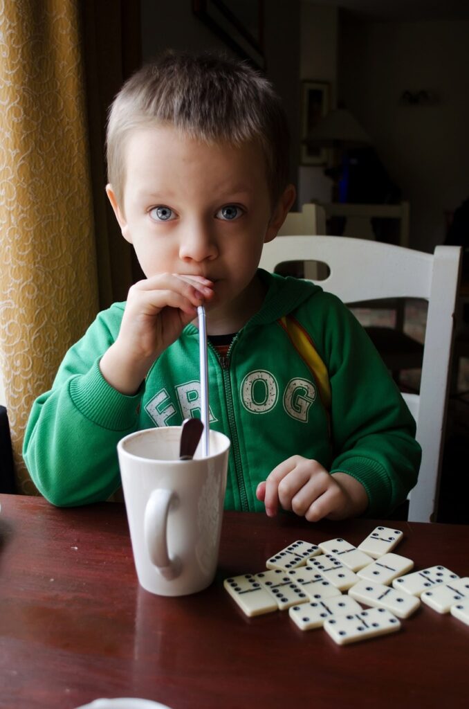 kid drinking a milkshake at a restaurant for an experience gift for kids idea 