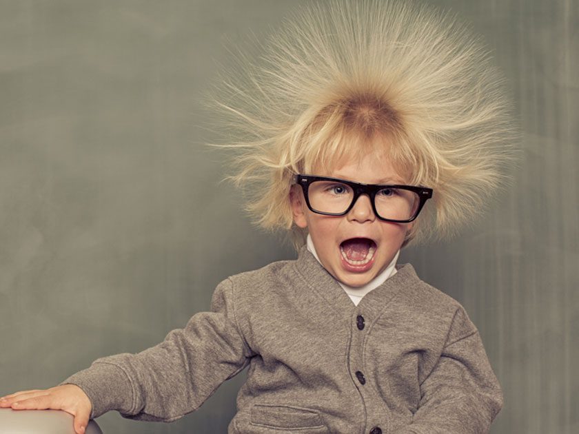 Kid with hair sticking up from static electricity