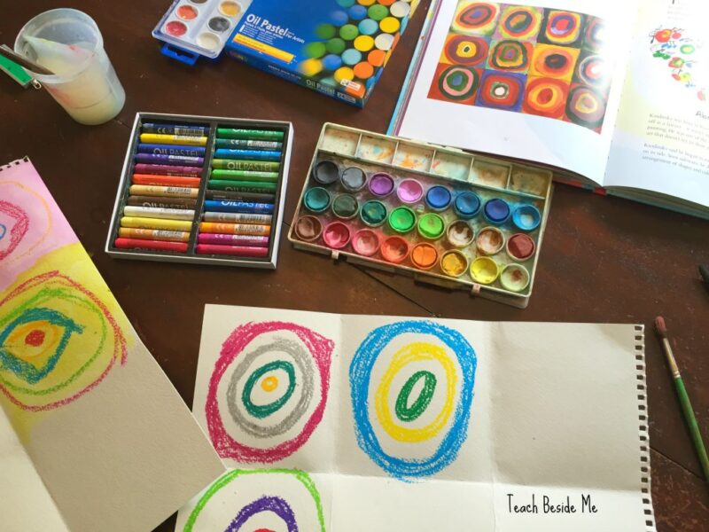 Art Supplies flank a drawing in the circle style of artist Kandinsky