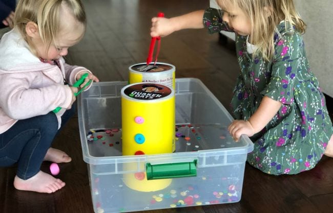 children playing with buttons