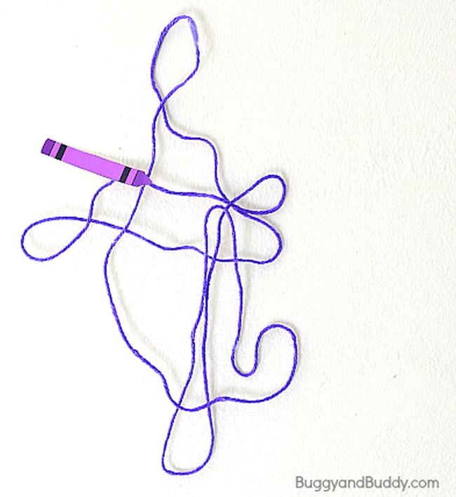 Purple yarn stiffened and shaped into a pattern, with a paper purple crayon at one end (Kindergarten Art)