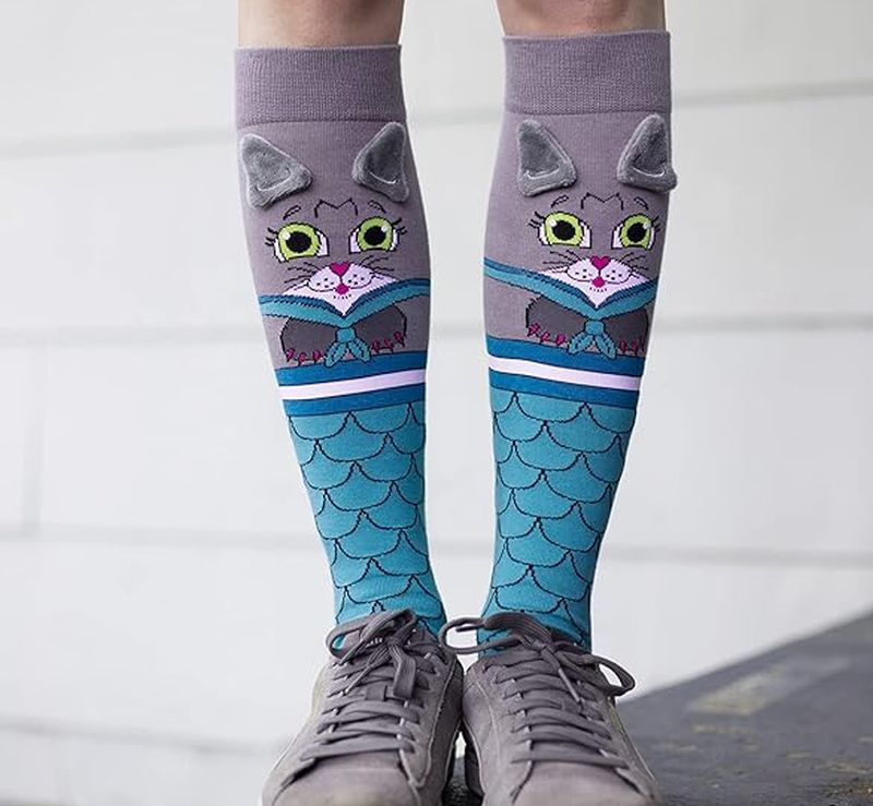 Knee-high socks with cat faces and 3-D eaars