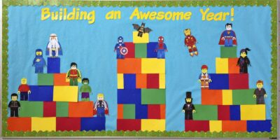 Building an awesome year LEGO themed bulletin board with LEGO people on top of the buildings