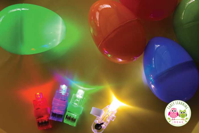 Easter eggs are filled with small lights of different colors.