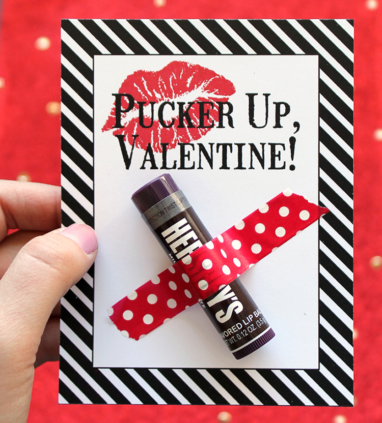 A clever valentine with a lip balm attached that says "Pucker up valentine" 