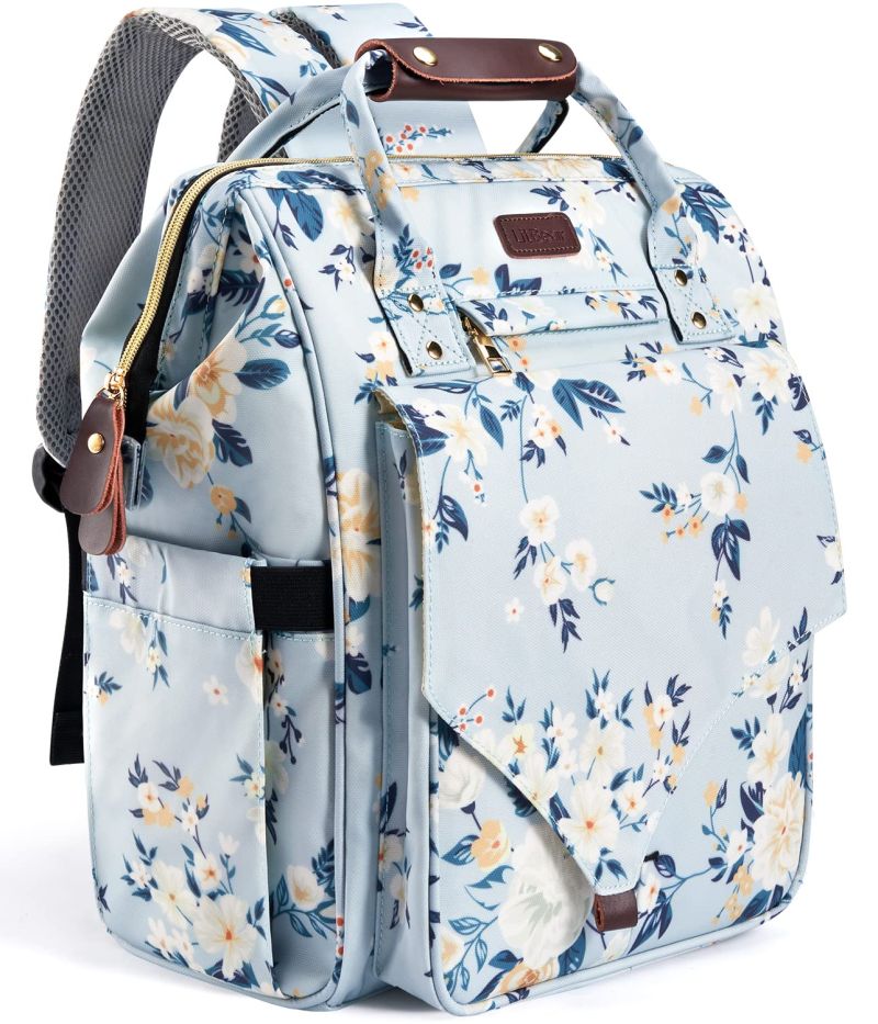 Blue floral diaper bag with top opening and front and side pockets, used as a teacher backpack