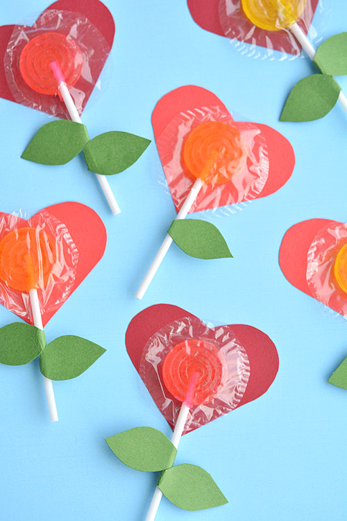 Valentines made from lollipops and construction paper hearts