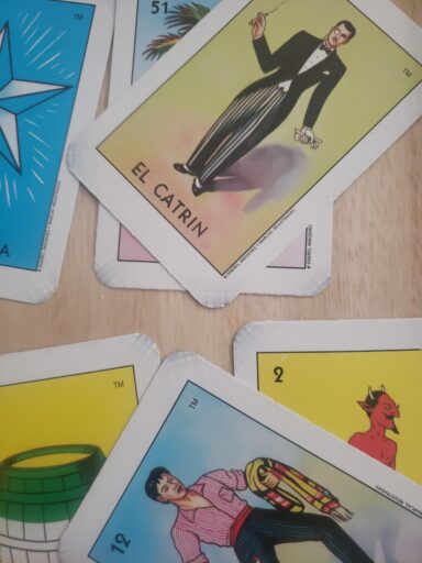 Loteria game cards on desk, as an example of Hispanic Heritage Month activities.