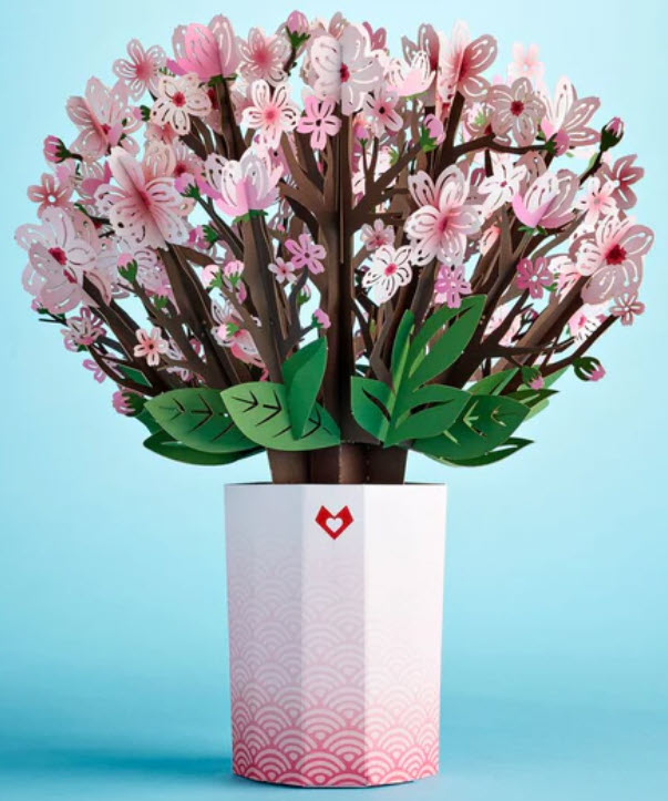 Paper bouquet of cherry blossoms in a paper vase