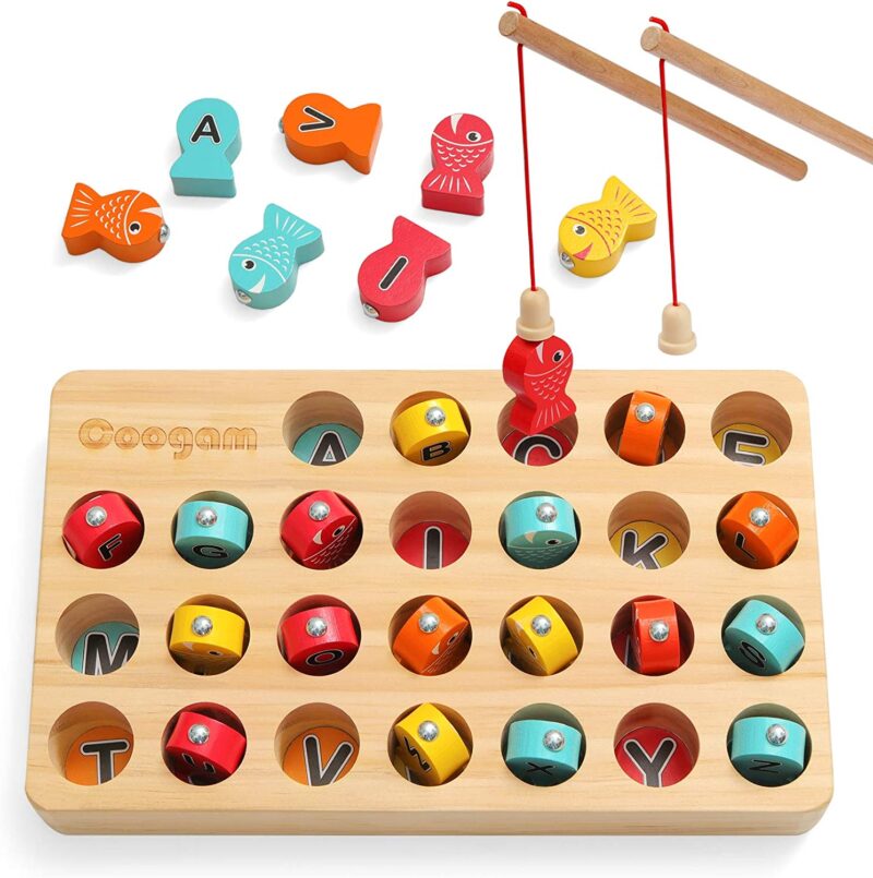 A wooden board has holes with fish with letters on them and magnets in the holes. There are wooden fishing poles that also have magnets on the end of them.