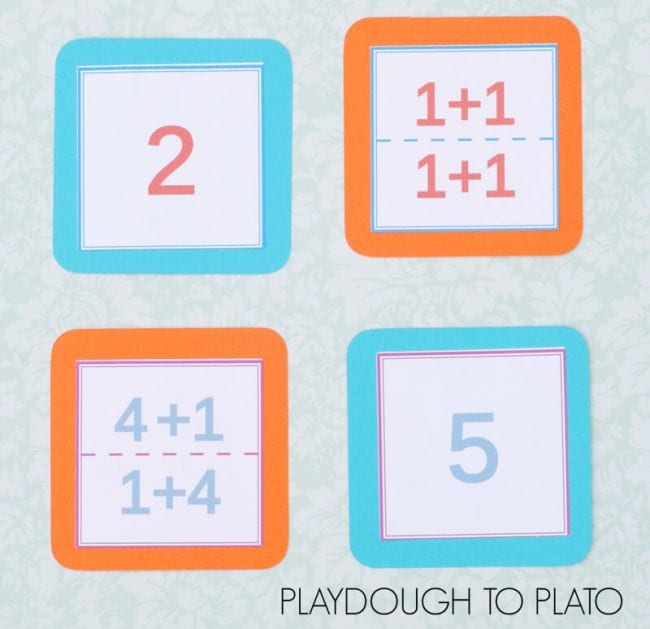 Four cards with math problems or answers on each- math facts games