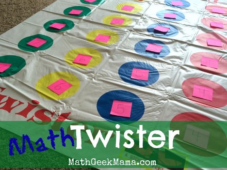 twister mat with sticky notes with math problems on them for a math facts game 