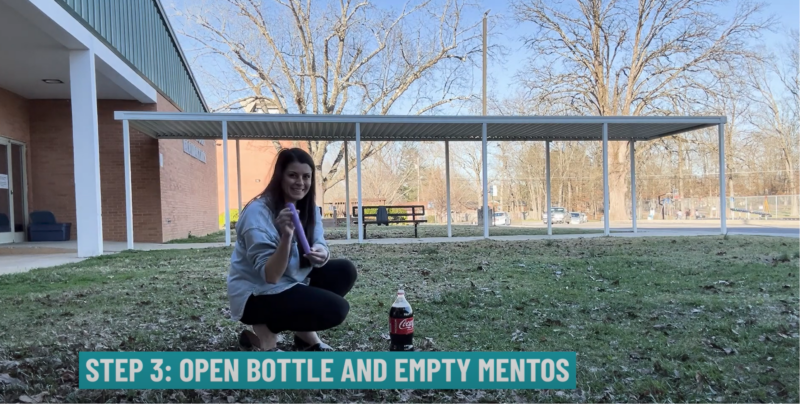 Teaching stooping outside school doing and experiment with Mentos and Coke.