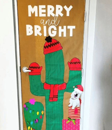 Door with decor of a cactus and words "Merry and Bright"