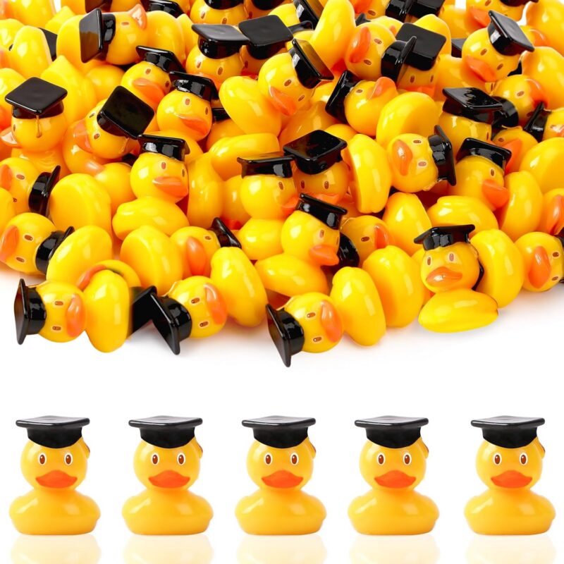 A bunch of yellow rubber ducks wearing graduation hats