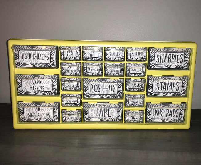 Yellow classroom organizer with black and white palm leaf printed drawers