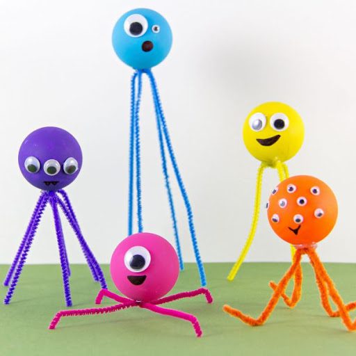 Colorful monsters made of pipe cleaners and googly eyes