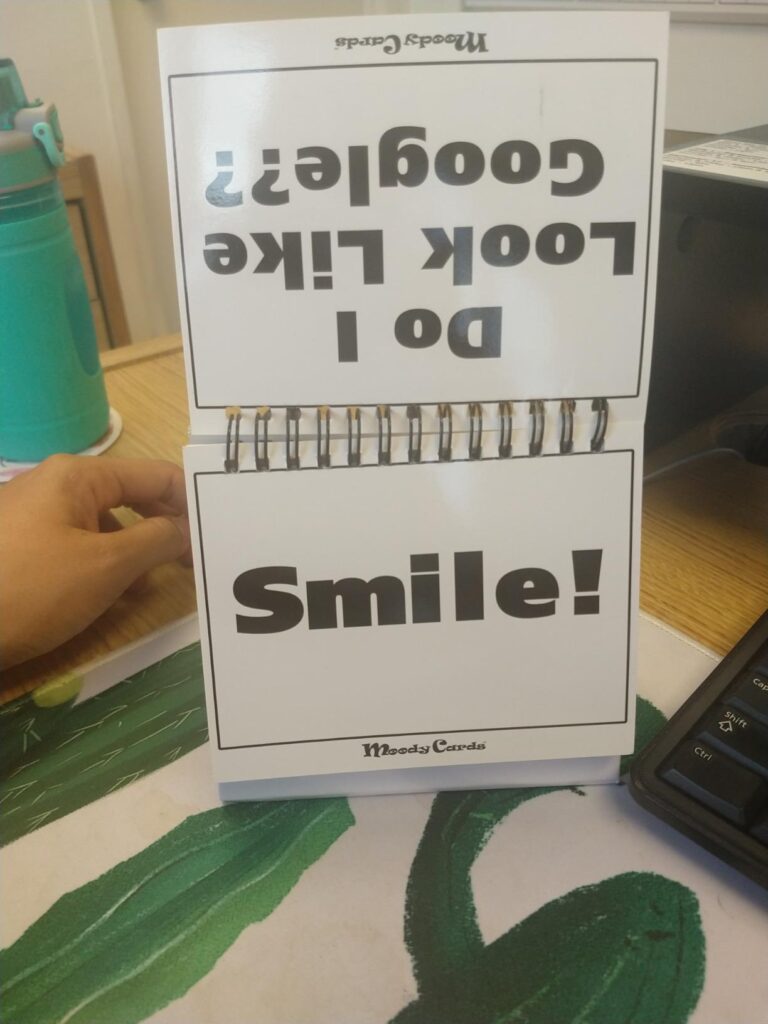 example of moody cards that you can flip over to say different phrases like smile or do i look like google 