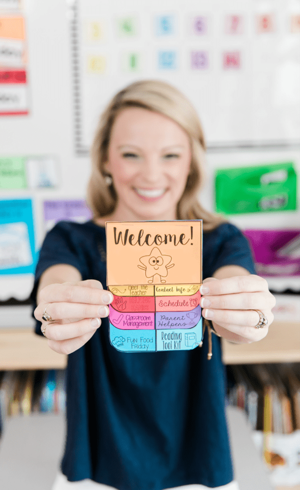 photo-of-mrs.-d-holding-welcome-card