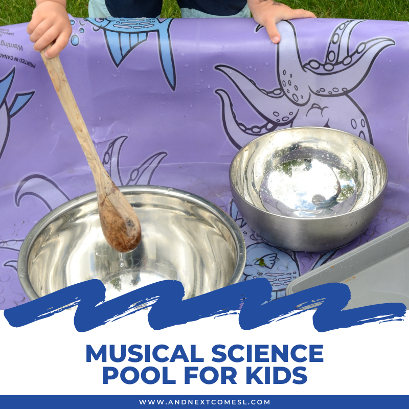 A kiddie pool has different size metal mixing bowls in it and a child's hand is seen with a wooden spoon inside them. 