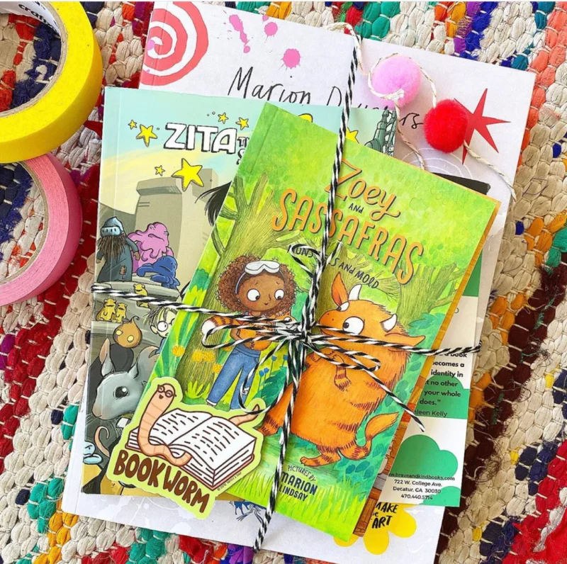 package of books from a book subscription box for a kids subscription box idea
