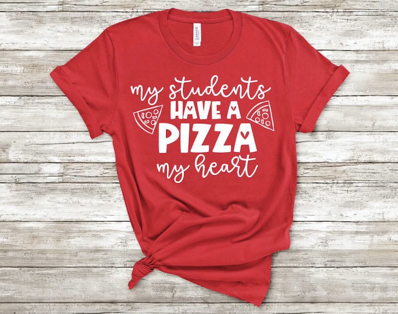 Red shirt with the words My Students Have a Pizza My Heart