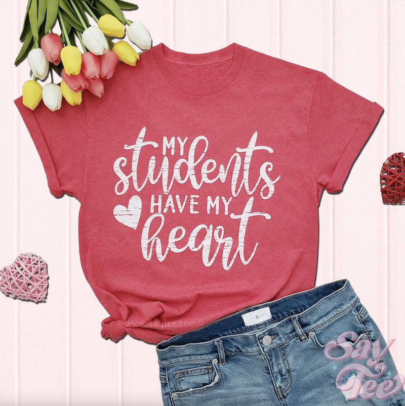 Light red shirt that says My Students Have My Whole Heart