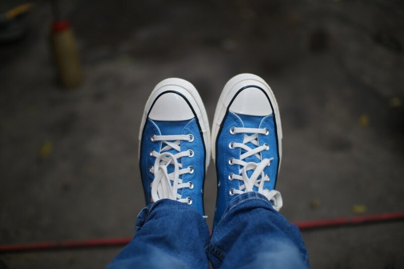 A pair of light blue Converse sneakers